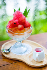 shaved iced with red syrup and watermelon