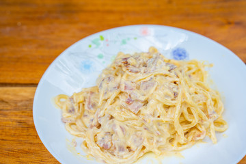 carbonara spaghetti with bacon and parmesan cheese