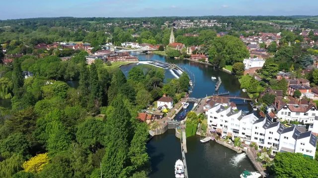 4K aerial footage captured over the River Thames at Marlow, flying over the lock and weir towards Marlow town centre