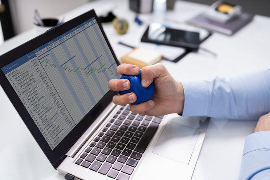 Businessman Holding Stress Ball