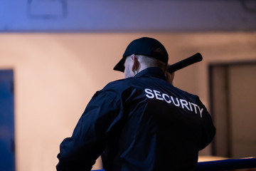 Security Guard Walking Building Perimeter