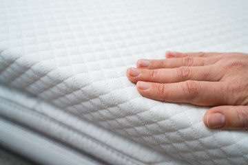 Hand Testing Mattress