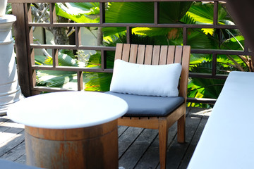 wooden chair and sofa couch for relaxing on terrace balcony