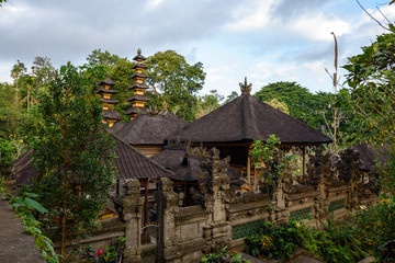 Fototapeta na wymiar Ancient Pura Gunung Lebah temple near the starting point of Campuhan Ridge Walk in Ubud, Bali, Indonesia