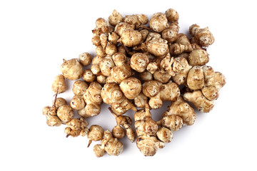 Jerusalem artichokes isolated on white