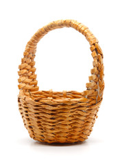Empty small basket woven from paper on a white background