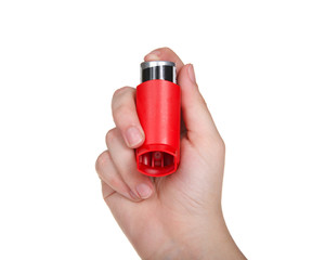 Young hand holding bronchodilator inhaler, isolated on white. Treatment for acute and or chronic...