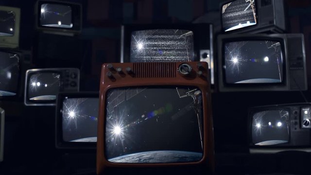The Sun and Planet Earth from Space as Seen on Retro TVs. Elements of this video furnished by NASA. 