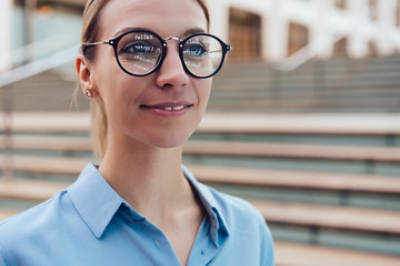 Portrait of Caucasian female of 20 years old looking at the camera. Smiling young woman wearing...