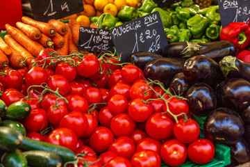 Bright fresh vegetables at the market. Healthy eating and vegetarianism. Close-up.
