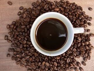 coffee beans on wooden background