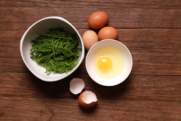 egg and acacia pennata for omelet cooking, Thai cuisine - calls that cha-om omelet