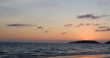 Sunset beautiful golden yellow. Beach, sea, sandy beach. On twilight.