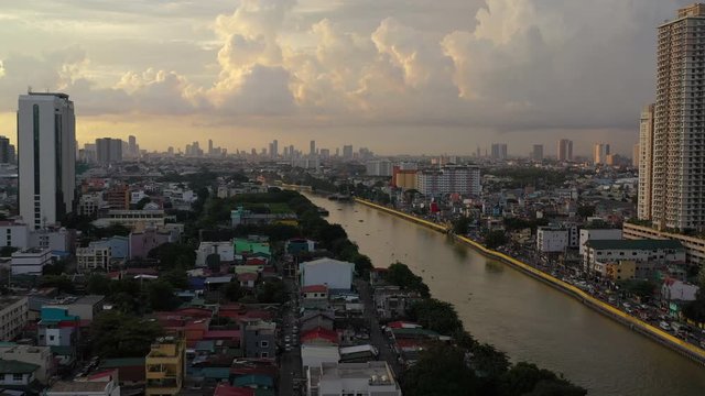 Aerial Philippines  Manila Mandaluyong City September 2019 Sunset 4K Mavic Pro  Aerial video of downtown Manila in the Philippines in Mandaluyong City district during a beautiful evening sunset.