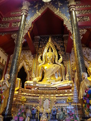 Beautiful golden Buddha statue in Thai temple.