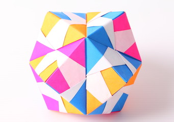 Colorful Geometric Origami Ball on white background.