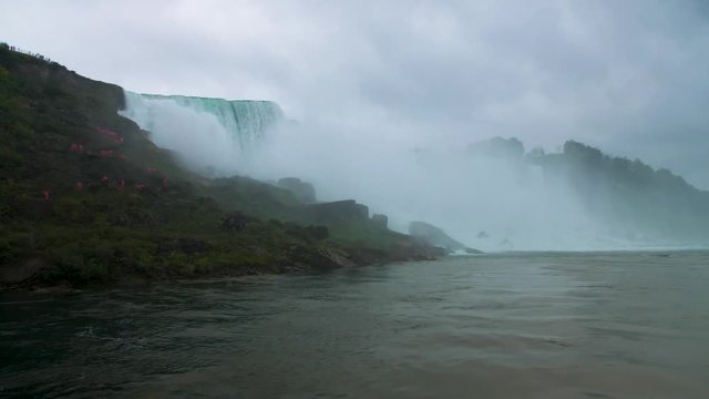 Couple Under Waterfall At Niagara Falls Laughing Fun Adventure Tourists