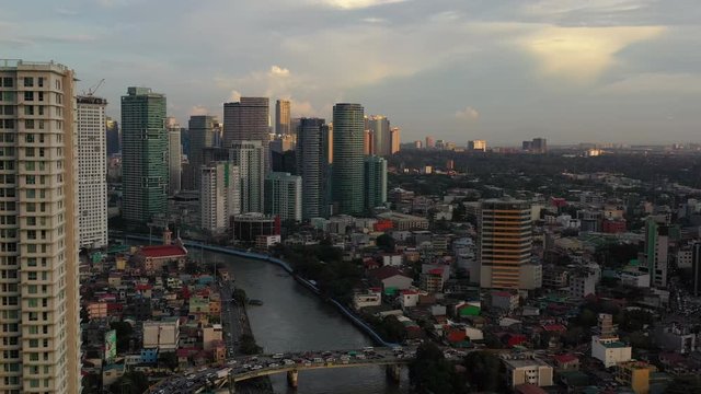 Aerial Philippines  Manila Mandaluyong City September 2019 Sunset 4K Mavic Pro  Aerial video of downtown Manila in the Philippines in Mandaluyong City district during a beautiful evening sunset.