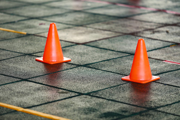 Red cone on the floor for made line