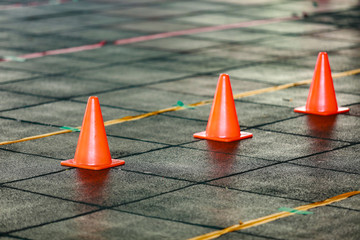 Red cone on the floor for made line