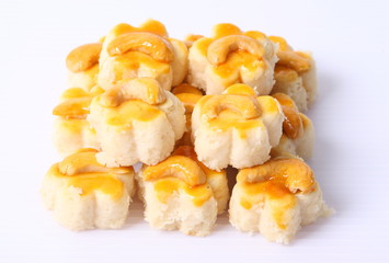 Almond macaroons on white background.