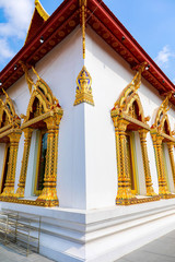 Architecture of windows and elaborately decorated pillars.Bangkok Thailand.