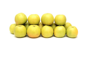 group of yellow apples on a white background, live vitamins, natural iron in fruits