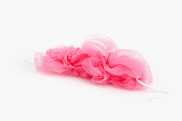 body scrubber, personal hygiene of a person, bathe in a bath or shower using a soapy sponge  F