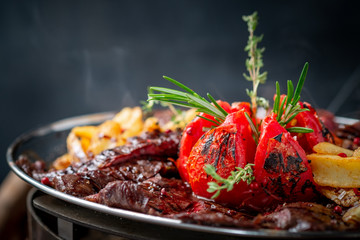 Mixed roast beef steaks set on a plate of tenderloin and Striploin. Barbecue menu for the restaurant