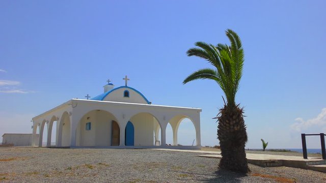 Beautiful little greek orthodox church on a background of blue sky. Church of Agia Thekla near Ayia Napa, Cyprus. 