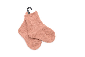 terry socks for a child with a hook for a hanger on a white background