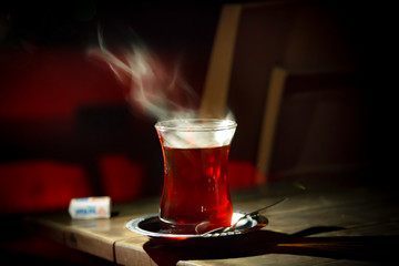 Turkish tea against green nature