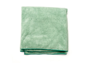 terry towel used after taking a shower or in a spa on a white background