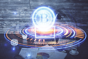 Double exposure of blockchain theme hologram and table with computer background. Concept of bitcoin...