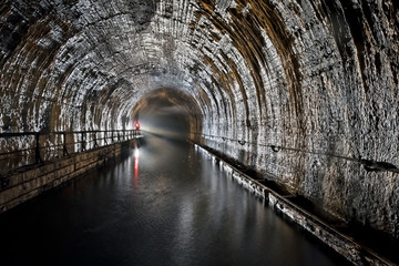 Naklejka premium Abandoned canalization under city