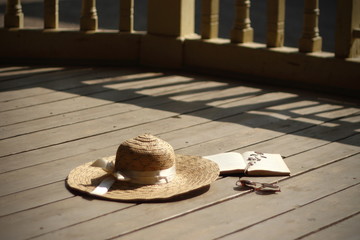 still life with hat and book