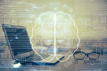 Multi exposure of work table with computer and brain hologram. Brainstorm concept.