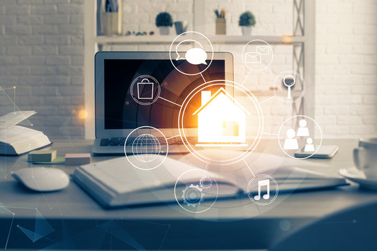 Desktop computer background in office and big town buildings hologram drawing. Double exposure. Smart city concept.