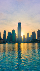 ew skyscrapers of Downtown Dubai at sunset
