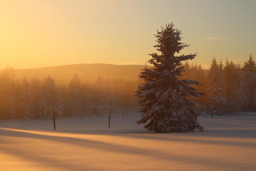 sunset in winter mountains