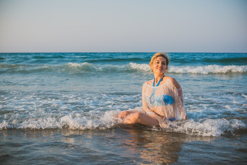 Spring - Summer season. Vacation and travelling time. Woman at sea, pretty nice view 