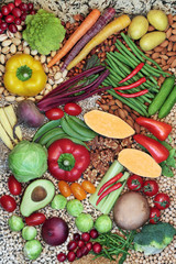 Vegan food for healthy diet with foods high in protein, vitamins, minerals, anthocyanins, antioxidants, smart carbs and dietary fibre. Foods for a healthy planet concept.  Flat lay.