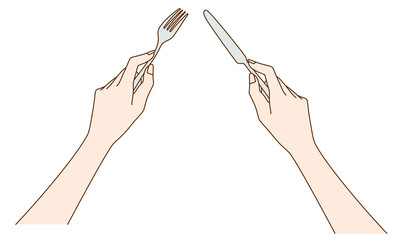 フォークとナイフを持つ女性の手元
