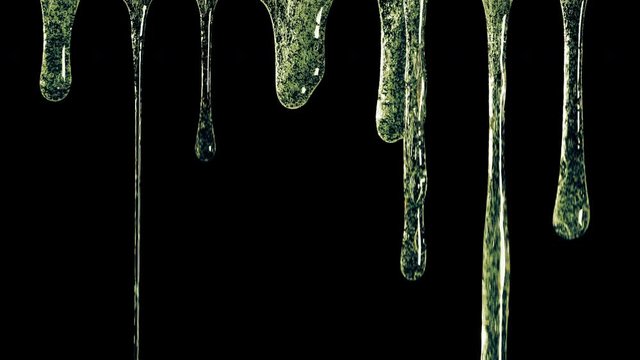 Colored mucus flowing from top to bottom on the dark background