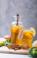 Healthy tea kombucha with lemon and cinnamon.