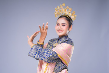 A beautiful Malaysian traditional female dancer with a charming smile performing a cultural dance...