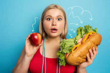 Fat girl does gym and want to eat a sandwich. Concept of indecision and doubt