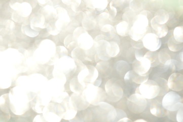 Abstract glittering sheet bokeh reflected in sunlight