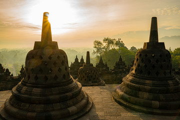 the biggest Buddhist temple in the world. Borobodur temple during sunrise with stunning colours and many stupas located close to Yogyakarta on Java, Indonesia