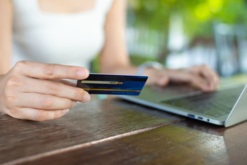 Young women enjoying online shopping